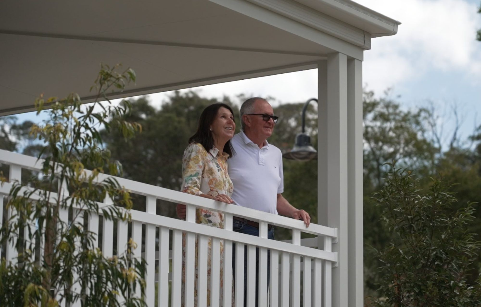 couple enjoying woodside bungalow outlook